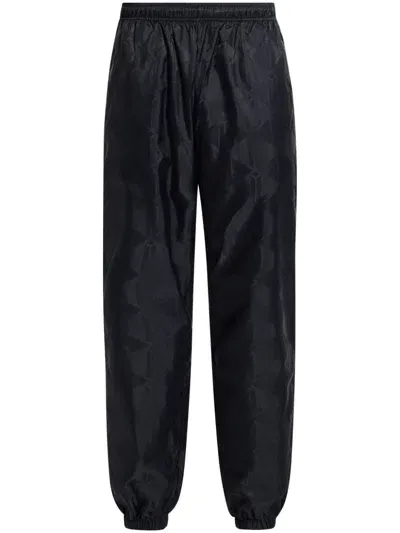 Lacoste Monogram-jacquard Track Pants In Schwarz