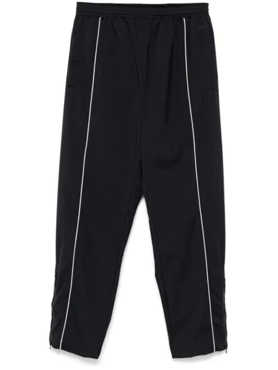 Lacoste Piped-trim Trousers In Black