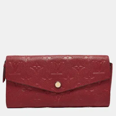 Pre-owned Louis Vuitton Aurore Monogram Empreinte Leather Sarah Wallet In Burgundy