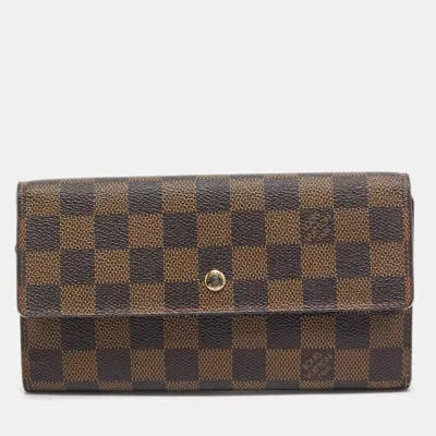 Pre-owned Louis Vuitton Damier Ebene Canvas Porte-tresor International Wallet In Brown