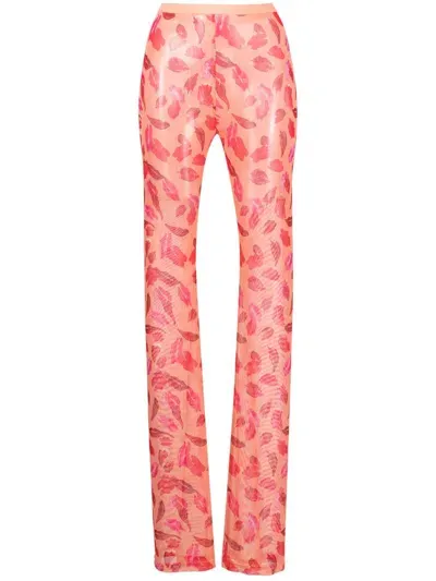 Marco Rambaldi Mouth-print Slim-cut Trousers In Orange