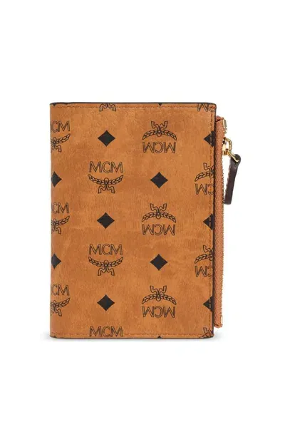 Mcm Monogrammed Bifold Wallet In Brown