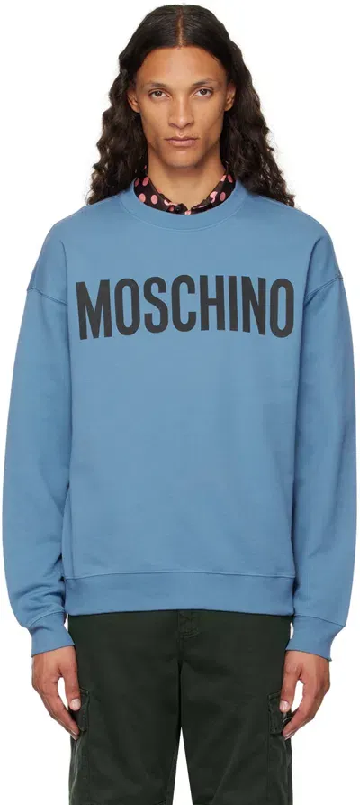 Moschino Blue Printed-logo Sweatshirt In Multi Light Blue