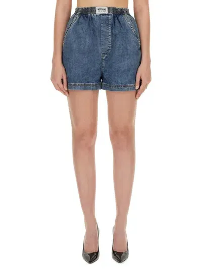 Moschino Jeans Logo Patch Washed Denim Shorts In Blue