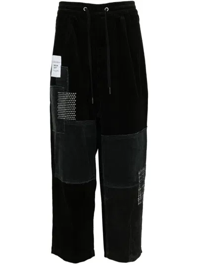 Musium Div. Patchwork Corduroy Trousers In Black