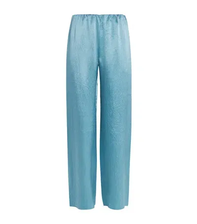 Nanushka Satin Brenda Trousers In Blue