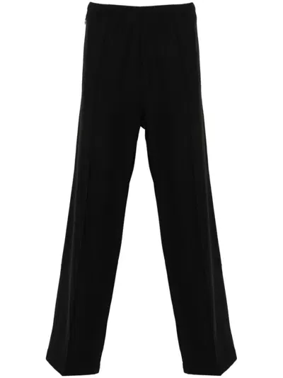 Needles Logo-embroidered Trousers In Black