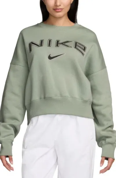 Nike Phoenix Oversize Logo Fleece Sweatshirt In Green