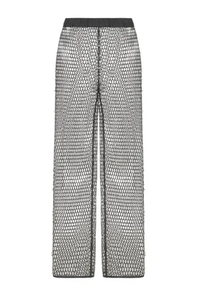 Nocturne Shimmering Threaded Mesh Pants In Grey