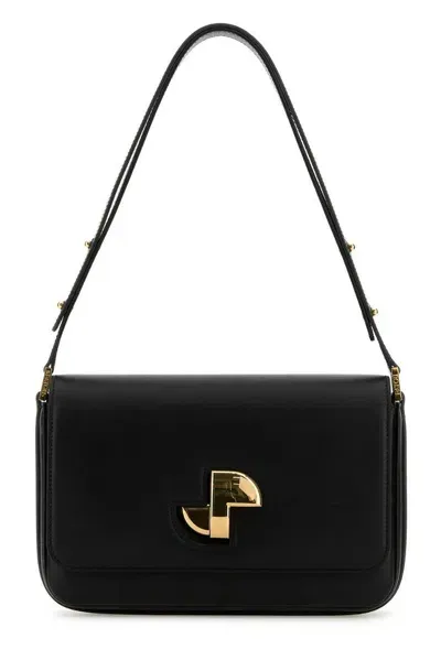 Patou Le  Lock Foldover Top Shoulder Bag In Black