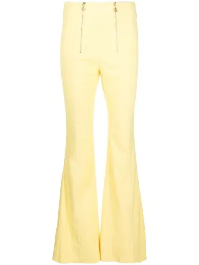 Patou Zip-detail Tweed Flared Trousers In Yellow