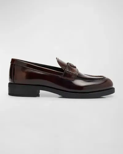 Prada Calfskin Logo Slip-on Loafers In Bruciato