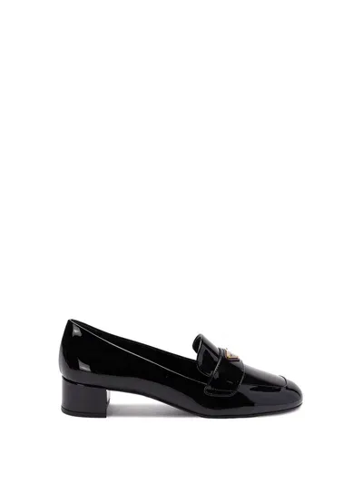 Prada Heeled Patent Leather Loafers In Black  