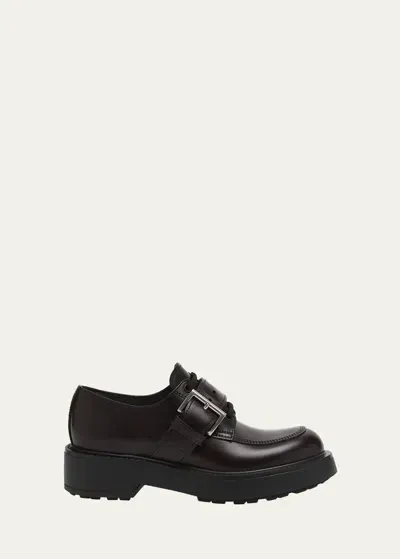 Prada Leather Belted Lace-up Loafers In Cordovan