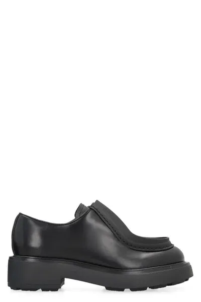 Prada Raised-edge Leather Lace-up Shoes In Black