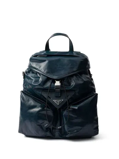 Prada Logo-plaque Leather Backpack In Blue