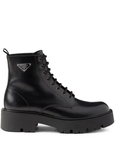 Prada Logo Plaque Leather Combat Boots In Black