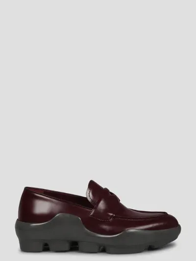 Prada Spazzolato Leather Loafers In Brown