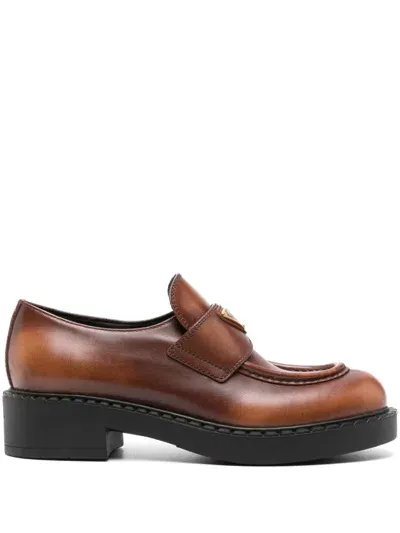 Prada Triangle-logo Leather Loafers In Braun