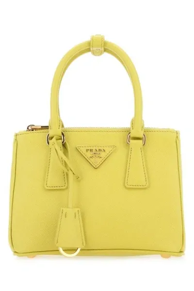 Prada Handbags. In Yellow