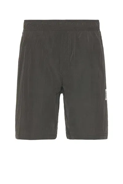 Reigning Champ Crinkle Nylon Match Short In Carbon