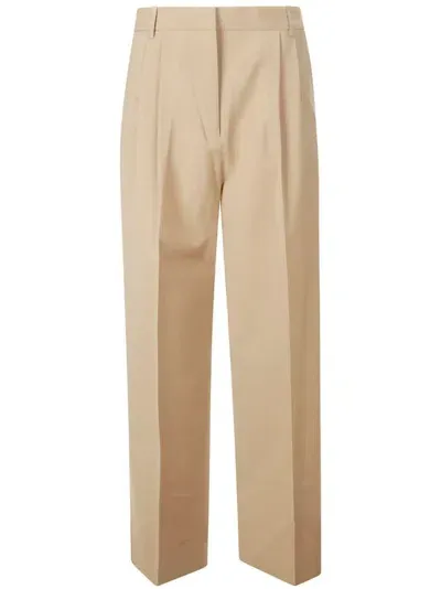 Rohe Pleated Slim-fit Trousers In Brown