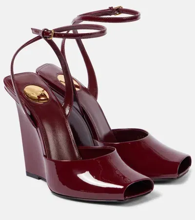 Saint Laurent La Scandale Patent Leather Wedge Sandals In Burgundy