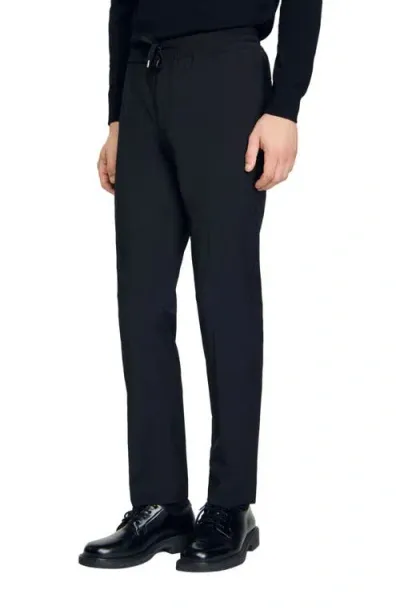 Sandro Elasticated Straight-leg Trousers In Black