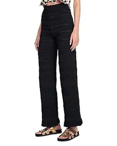 Sandro Frill Flared Pants In Black