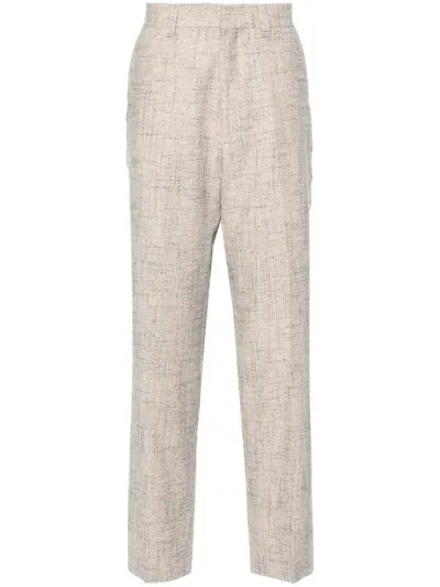 Sandro Patterned-jacquard Chino Trousers In Neutrals