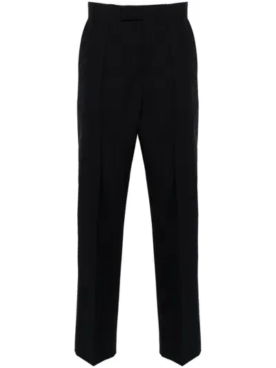 Sandro Pinstripe Trousers In Black