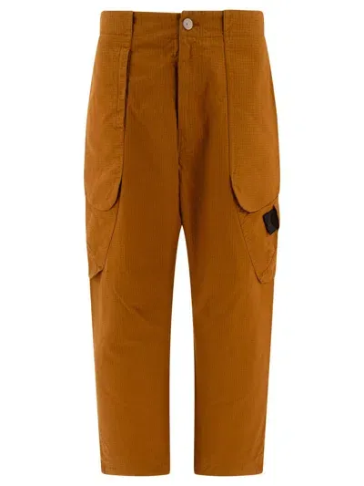 Stone Island "shadow Compass" Cargo Trousers In Brown