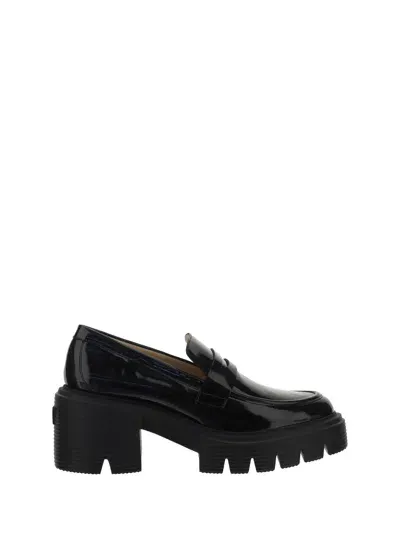 Stuart Weitzman Sleek Moccasin Flat Shoes With Chunky Platform And Timeless Design In Black