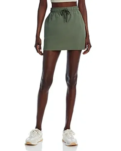 Sweaty Betty Explorer Mini Skirt In Green