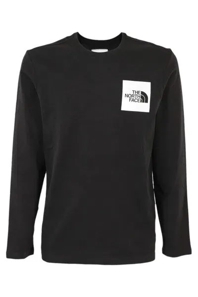 The North Face Logo Printed Long-sleeved T-shirt In Black