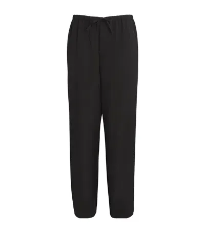 The Row Donatello Wool Trousers In Black