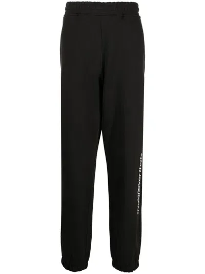 This Is Never That Logo-embroidered Cotton Track Pants In Black