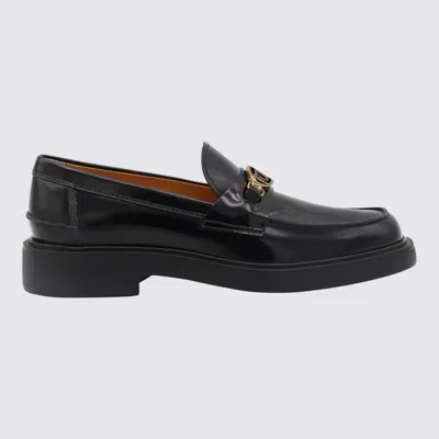 Tod's Black Leather Loafers