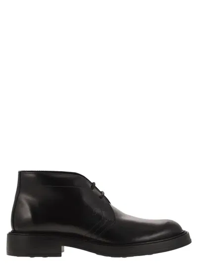 Tod's Leather Boots In Black