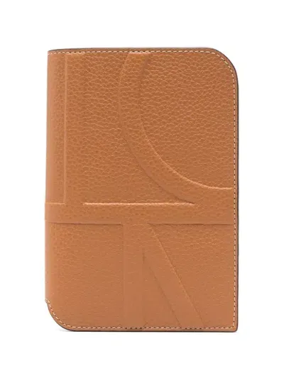 Totême Embossed-monogram Passport Holder In Brown