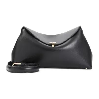 Totême T-lock Shearling Clutch In Black