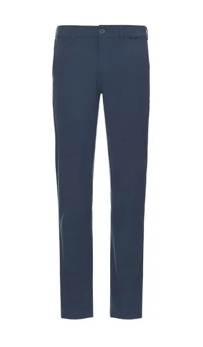 Travismathew Otc Tech Chino Pant In Blue