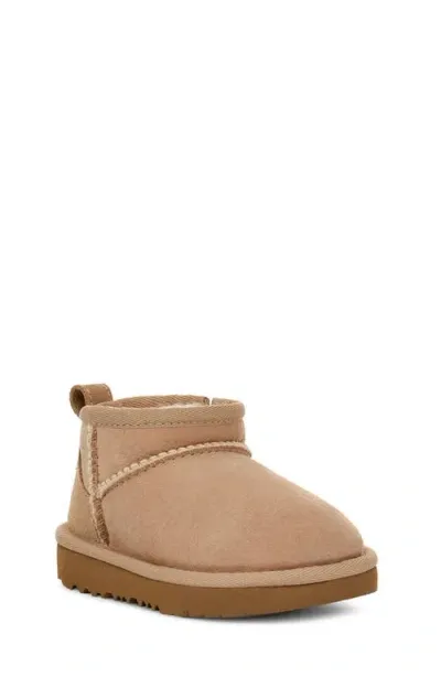 Ugg(r) Kids' Classic Ultra Mini Water Resistant Boot In Sand