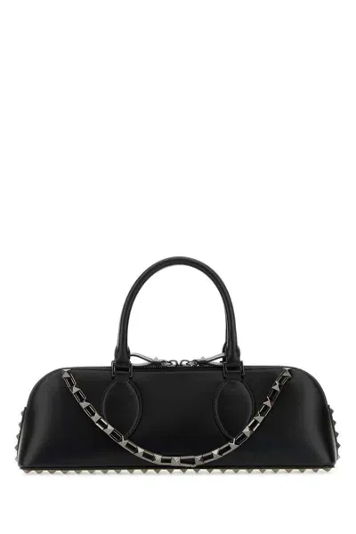 Valentino Garavani Handbags. In Black