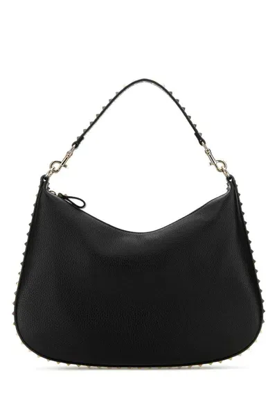 Valentino Garavani Handbags. In Black