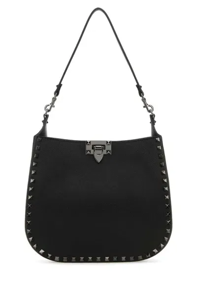 Valentino Garavani Handbags. In Black