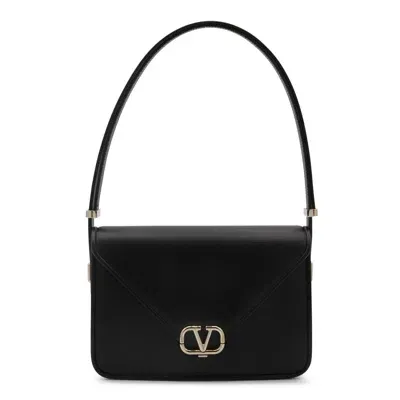 Valentino Garavani Handbags. In Black