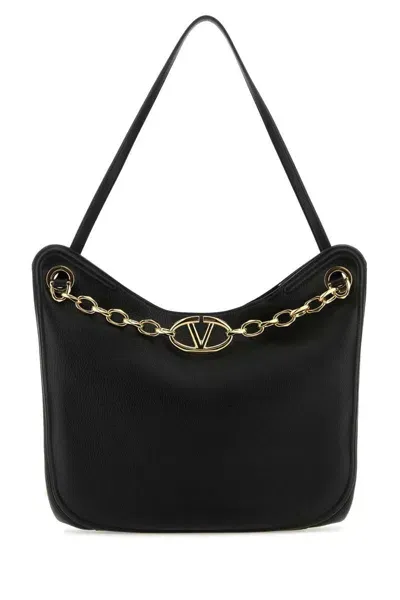 Valentino Garavani Handbags. In Black