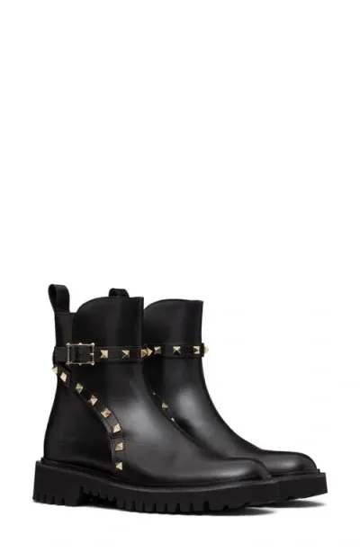 Valentino Garavani Rockstud Combat Boot In Nero/gold