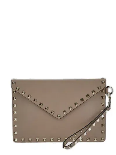 Valentino Garavani Rockstud Foldover Top Clutch Bag In Pink